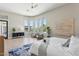 Bright main bedroom boasts large windows, a seating area, and sleek, modern design at 7032 E Balancing Rock Rd, Scottsdale, AZ 85266