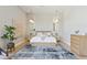 Serene primary bedroom features stylish decor, neutral tones, and abundant natural light throughout at 7032 E Balancing Rock Rd, Scottsdale, AZ 85266