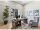 Inviting home office with stylish furnishings and natural light streaming through the window at 7032 E Balancing Rock Rd, Scottsdale, AZ 85266