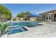 Backyard pool and spa with a large patio offer ample space for outdoor enjoyment and relaxation at 7032 E Balancing Rock Rd, Scottsdale, AZ 85266