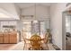 Cozy dining area bathed in natural light, complemented by a view of the backyard at 7333 N 69Th Ave, Glendale, AZ 85303
