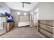 Bright bedroom featuring a bed, ceiling fan, and adjacent bathroom at 7857 N 21St Ave, Phoenix, AZ 85021
