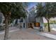 Modern townhome exterior with unique architectural details, desert landscaping and inviting front entrance at 7857 N 21St Ave, Phoenix, AZ 85021