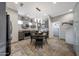 Stylish eat-in kitchen features modern gray cabinets and stainless steel appliances at 7857 N 21St Ave, Phoenix, AZ 85021