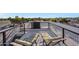 Rooftop deck with lounge chairs, providing an outdoor space with views and relaxation under the open sky at 7857 N 21St Ave, Phoenix, AZ 85021