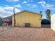 Backyard featuring privacy fence, patio, and gravel at 8209 E 5Th Ave, Mesa, AZ 85208