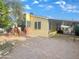 The property features a cozy porch and carport, providing ample outdoor space at 8209 E 5Th Ave, Mesa, AZ 85208