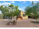 Charming single-story home with well-maintained landscaping, mature trees, and ample parking space at 8209 E 5Th Ave, Mesa, AZ 85208
