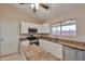 Updated kitchen featuring stainless steel appliances, modern cabinetry, and ample natural light at 825 E Michigan Ave, Phoenix, AZ 85022