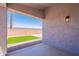 This view of the outdoor patio shows a clean backyard with gravel and artificial turf at 830 S Cerise --, Mesa, AZ 85208