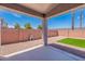 An outdoor patio featuring a low-maintenance backyard with gravel and artificial turf at 830 S Cerise --, Mesa, AZ 85208