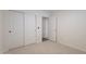 Simple bedroom with neutral carpet, closet and ensuite door at 830 S Cerise --, Mesa, AZ 85208