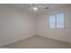 Neutral bedroom with window and ceiling fan at 830 S Cerise --, Mesa, AZ 85208