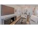 Comfortable living area with TV, console, and dining room view at 830 S Cerise --, Mesa, AZ 85208