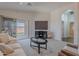 Cozy living room featuring sliding glass doors and neutral tones, perfect for relaxation and entertainment at 830 S Cerise --, Mesa, AZ 85208