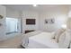 Cozy bedroom showing carpet, a TV, and ensuite bathroom for enhanced privacy and convenience at 830 S Cerise --, Mesa, AZ 85208