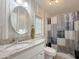 Bright bathroom featuring granite countertops and stylish shower curtain at 8600 E Broadway Rd # 88, Mesa, AZ 85208