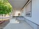 Charming front porch with seating and landscaped surroundings; accessible by stairs at 8600 E Broadway Rd # 88, Mesa, AZ 85208