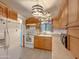 Functional kitchen with white appliances and ample cabinet space at 8600 E Broadway Rd # 88, Mesa, AZ 85208