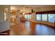 Spacious open-concept living and dining area with hardwood floors at 8600 E Broadway Rd # 88, Mesa, AZ 85208