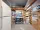 Functional workshop space with workbench, shelving, lighting, and storage solutions at 8600 E Broadway Rd # 88, Mesa, AZ 85208