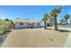 Single story home with a two car garage and low maintenance rock landscaping at 907 E Broadmor Dr, Tempe, AZ 85282