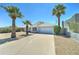 Single story home featuring a two car garage and low maintenance landscaping at 907 E Broadmor Dr, Tempe, AZ 85282