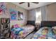 Shared room with twin beds, colorful bedding, and themed decorations at 9157 W Gary Rd, Peoria, AZ 85345
