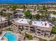 Aerial view of condo with pool access; red pin shows location in community at 9450 E Becker Ln # 1036, Scottsdale, AZ 85260