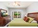Inviting bedroom featuring patio access, cozy decor, and a serene atmosphere for relaxation at 9450 E Becker Ln # 1036, Scottsdale, AZ 85260