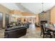 Spacious common area with a cozy fireplace, comfortable seating, and a bar area perfect for entertaining at 9450 E Becker Ln # 1036, Scottsdale, AZ 85260