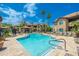 Beautiful community pool area with gazebo, lounge chairs, and lush landscaping creating a relaxing oasis at 9450 E Becker Ln # 1036, Scottsdale, AZ 85260