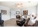 Comfortable living area featuring a fireplace, plush sofas, and contemporary decor at 9450 E Becker Ln # 1036, Scottsdale, AZ 85260