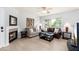 Inviting living room featuring a cozy fireplace, comfortable seating, and abundant natural light at 9450 E Becker Ln # 1036, Scottsdale, AZ 85260