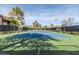Well-maintained tennis court featuring new net, dark fencing, and professional lighting at 9450 E Becker Ln # 1036, Scottsdale, AZ 85260