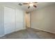 Bedroom showcasing closet with sliding doors and neutral carpet at 98 N Bay Dr, Gilbert, AZ 85233