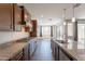Open kitchen featuring stainless steel appliances, a large island, and natural lighting at 98 N Bay Dr, Gilbert, AZ 85233