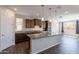 Spacious kitchen featuring an island, stainless appliances, wood floors, and recessed lighting at 98 N Bay Dr, Gilbert, AZ 85233