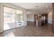 Living room with sliding doors opening to the patio and backyard at 98 N Bay Dr, Gilbert, AZ 85233