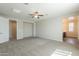 An open living room providing carpet flooring, recessed lights and lots of space at 98 N Bay Dr, Gilbert, AZ 85233
