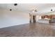 Open-concept living room flows seamlessly into the kitchen and dining area at 98 N Bay Dr, Gilbert, AZ 85233