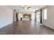 Open-concept living room with access to kitchen, dining, and outdoor areas at 98 N Bay Dr, Gilbert, AZ 85233