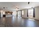 Spacious living room boasts wood-look tile floors and lots of natural light at 98 N Bay Dr, Gilbert, AZ 85233