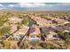 Beautiful desert home with a private pool and covered patio, perfect for outdoor living at 9816 E Stone Circle E Ln, Gold Canyon, AZ 85118