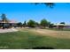 Recreational area with volleyball net, playground, and common area at 992 S Roanoke St, Gilbert, AZ 85296