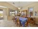 Bright dining room features a ceiling fan and plenty of natural light at 992 S Roanoke St, Gilbert, AZ 85296