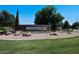 Stone monument marking the entrance to Greenfield Lakes, with lovely landscaping at 992 S Roanoke St, Gilbert, AZ 85296