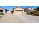 Charming single-story home with a two-car garage, low-maintenance landscaping, and a welcoming front entrance at 992 S Roanoke St, Gilbert, AZ 85296