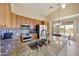 Kitchen with granite countertops, tile backsplash, stainless appliances, and breakfast nook at 992 S Roanoke St, Gilbert, AZ 85296