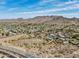 Great aerial view highlighting neighborhood layout, homes and views of the surrounding mountains at 10007 N 30Th Pl, Phoenix, AZ 85028